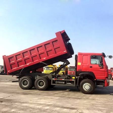 Dump trucks for hauling construction materials and earthworks.
